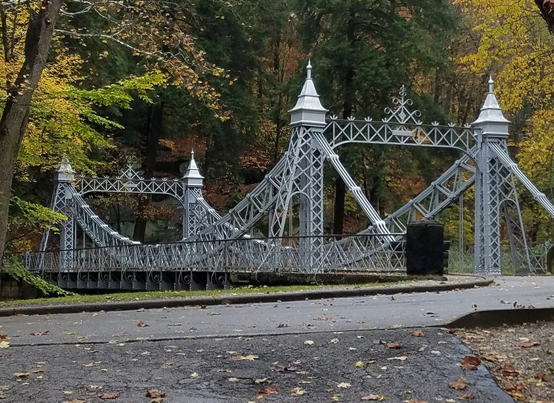 Austintown, OH - Iron Bridge and Green Trees at Mill Creek Park in Mahoning County, Ohio